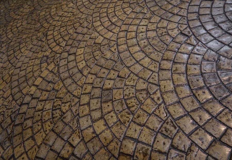 Stamped and colored concrete patio with a stone pattern finish
